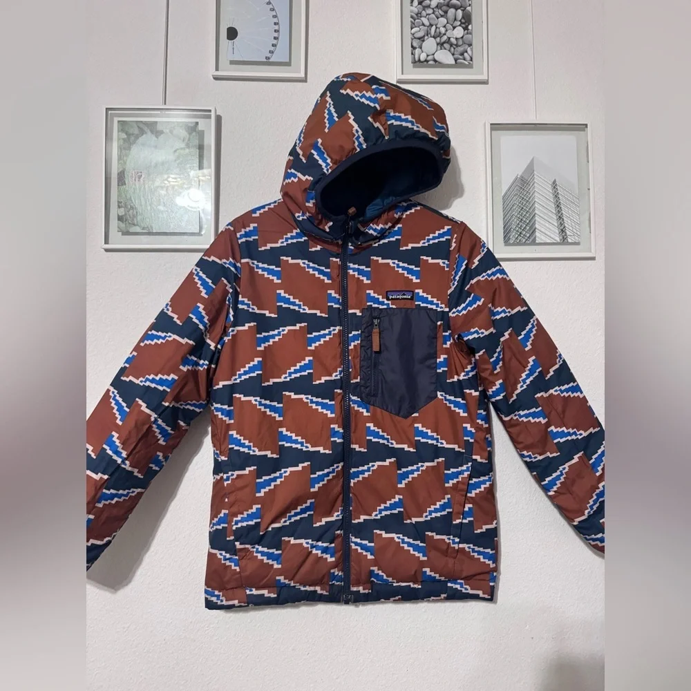 Patagonia Blue and Brown Puffer Jacket with Geometric Design